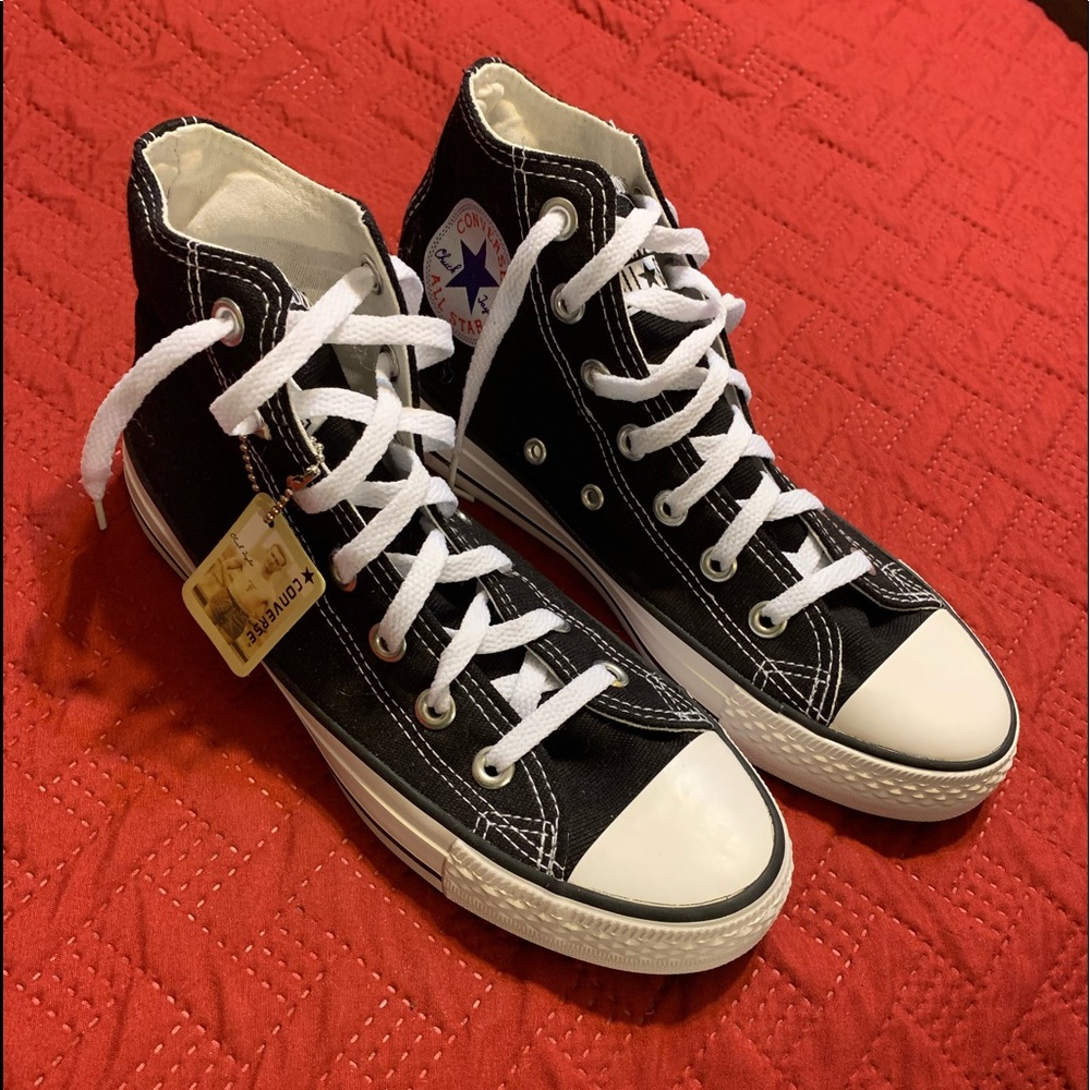 New high top converse women size 6.5 men size 4.5